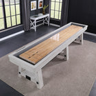A Playcraft 16' Yukon Pro-Style Shuffleboard Table in Northern Drift sits on a rug in a modern room.