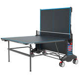 Kettler Outdoor 6 Tennis Table 4-Player Bundle with solo play, wheels, and paddle storage.