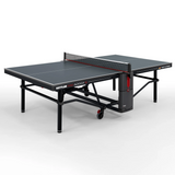 Kettler Pro Indoor 15 Table Tennis Table with net, sturdy frame, and smooth wheels.
