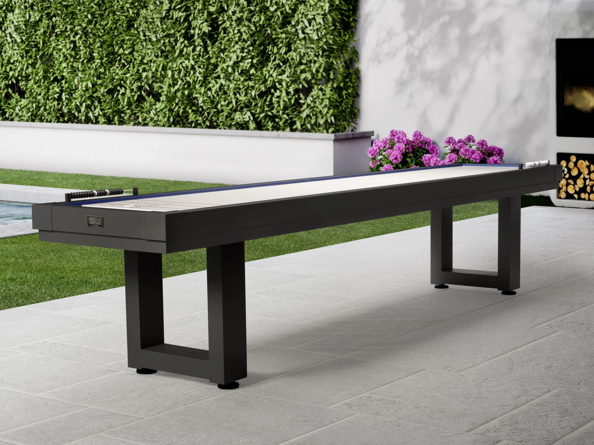 The American Heritage Lanai 9' Outdoor Shuffleboard Table in Obsidian Black sits on the patio.