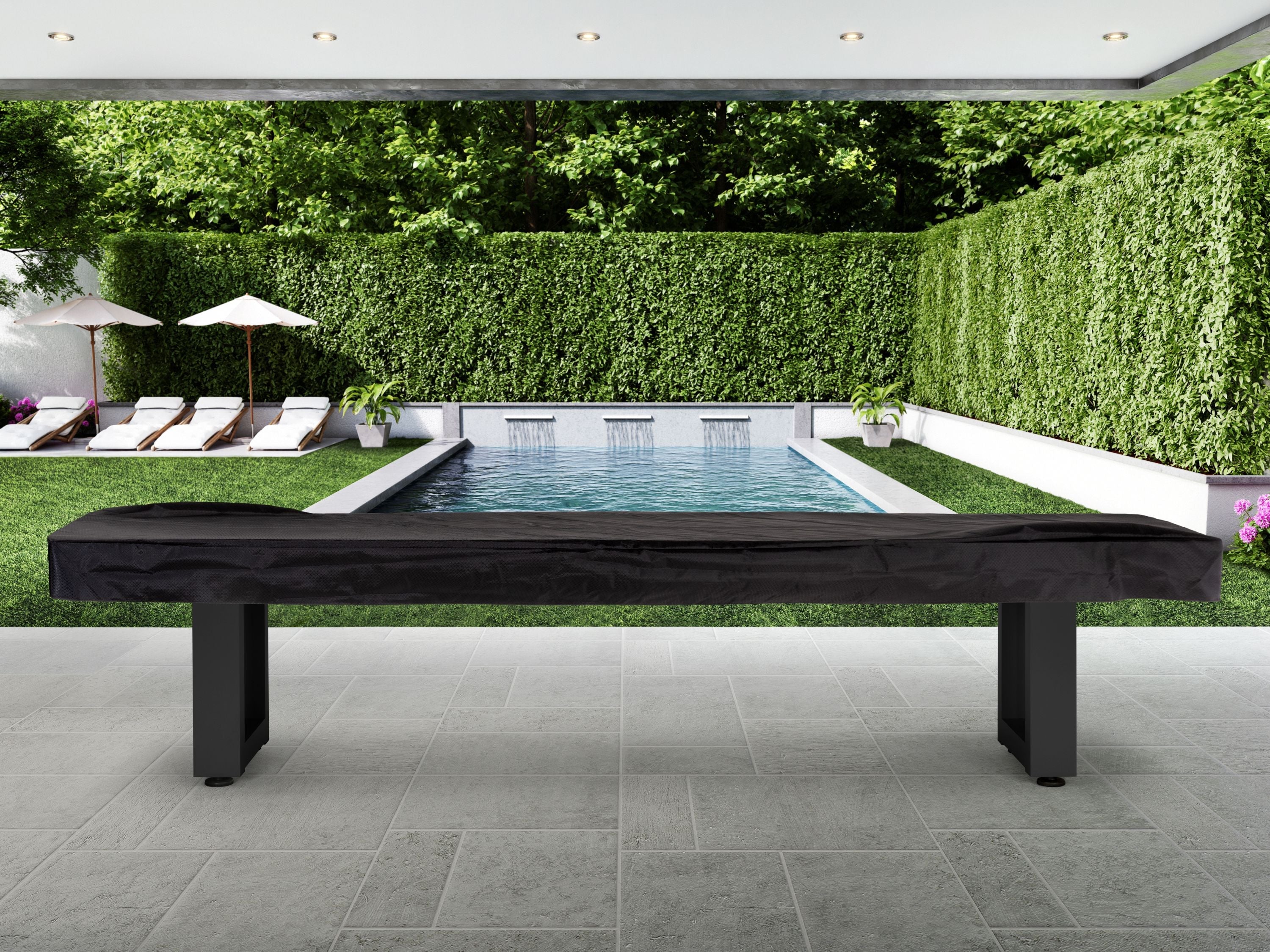 Covered outdoor bench on a patio, with an American Heritage Lanai 9' Shuffleboard Table nearby.