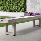 American Heritage Lanai 12' Outdoor Shuffleboard Table in Oyster Grey on a patio with pucks.