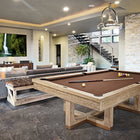 Modern living room with a Brunswick Billiards Matanza 8' Slate Pool Table in Sandwashed.