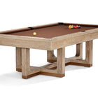 Brunswick Billiards Matanza 8' Sandwashed Pool Table set for play with balls and cue ball.