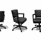 Three black office chairs with quilted design on a white background