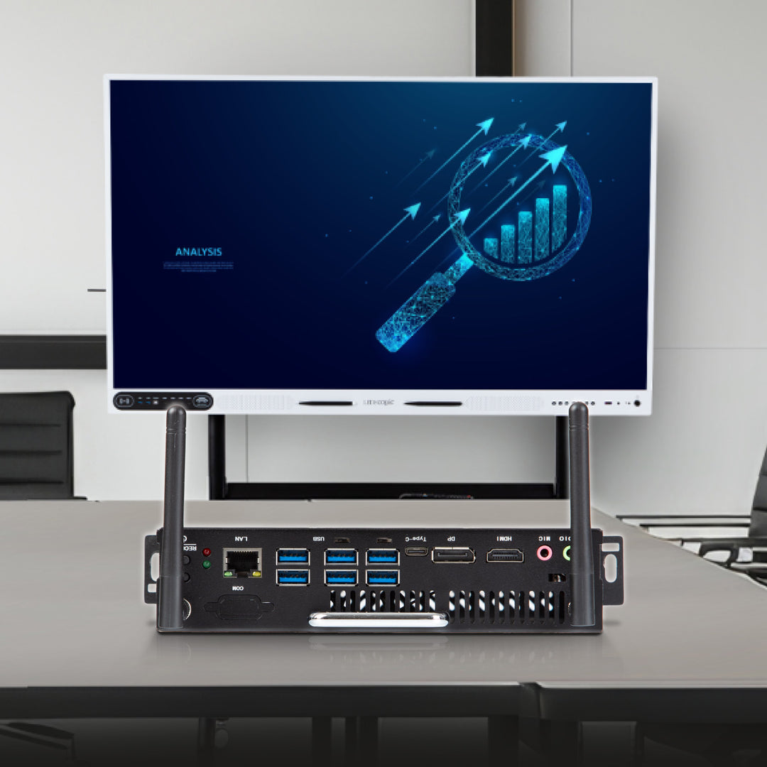 Board with a stylized graphic on the screen, placed on a desk.