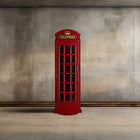 The RAM Game Room Old English Telephone Booth Cue Holder stands in a modern, empty room.