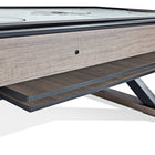 Close-up of Brunswick Billiards Premier Air Hockey Table with storage shelf under the surface.