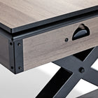 Close-up of the Brunswick Billiards Premier Air Hockey Table with black metal legs and drawer handle.