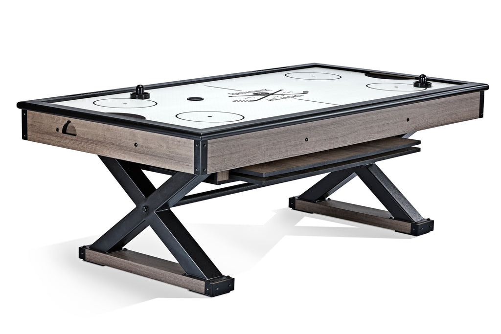 Brunswick Billiards Premier Air Hockey Table with black legs, paddles, and dining top option.
