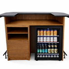 Wooden bar counter with black top and built-in cooler filled with drinks on a white background