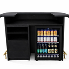 Black bar with a built-in cooler filled with drinks on a white background