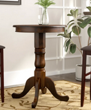 RAM Game Room Pub Table - Cappuccino with glass top and a small vase of greenery displayed.