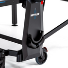 Close-up of Kettler Sedona Outdoor Table Tennis Table leg with wheels and paddle holder.
