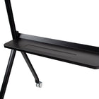 Black metal shelf with wheels on a white background