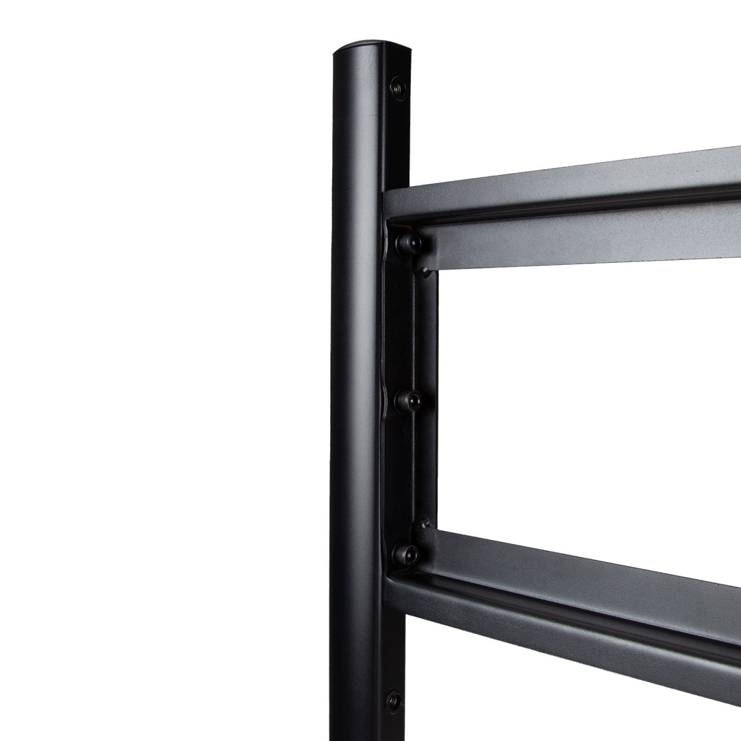 Close-up of a black metal shelf bracket on a white background
