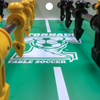 Yellow and black players on a green Tornado Sport II Foosball Table in Weathered Walnut.