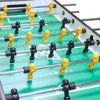 Close-up of Tornado Sport II Foosball Table in Weathered Walnut with yellow and black players.