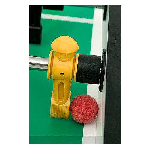 Close-up of yellow figure and red ball on Tornado T-3000 Tournament Foosball Table in silver.