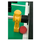 Close-up of yellow figure and red ball on Tornado T-3000 Tournament Foosball Table in silver.