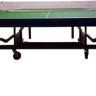 Butterfly Nippon 22 Table Tennis Table with net, wooden legs, and wheels. USATT approved.