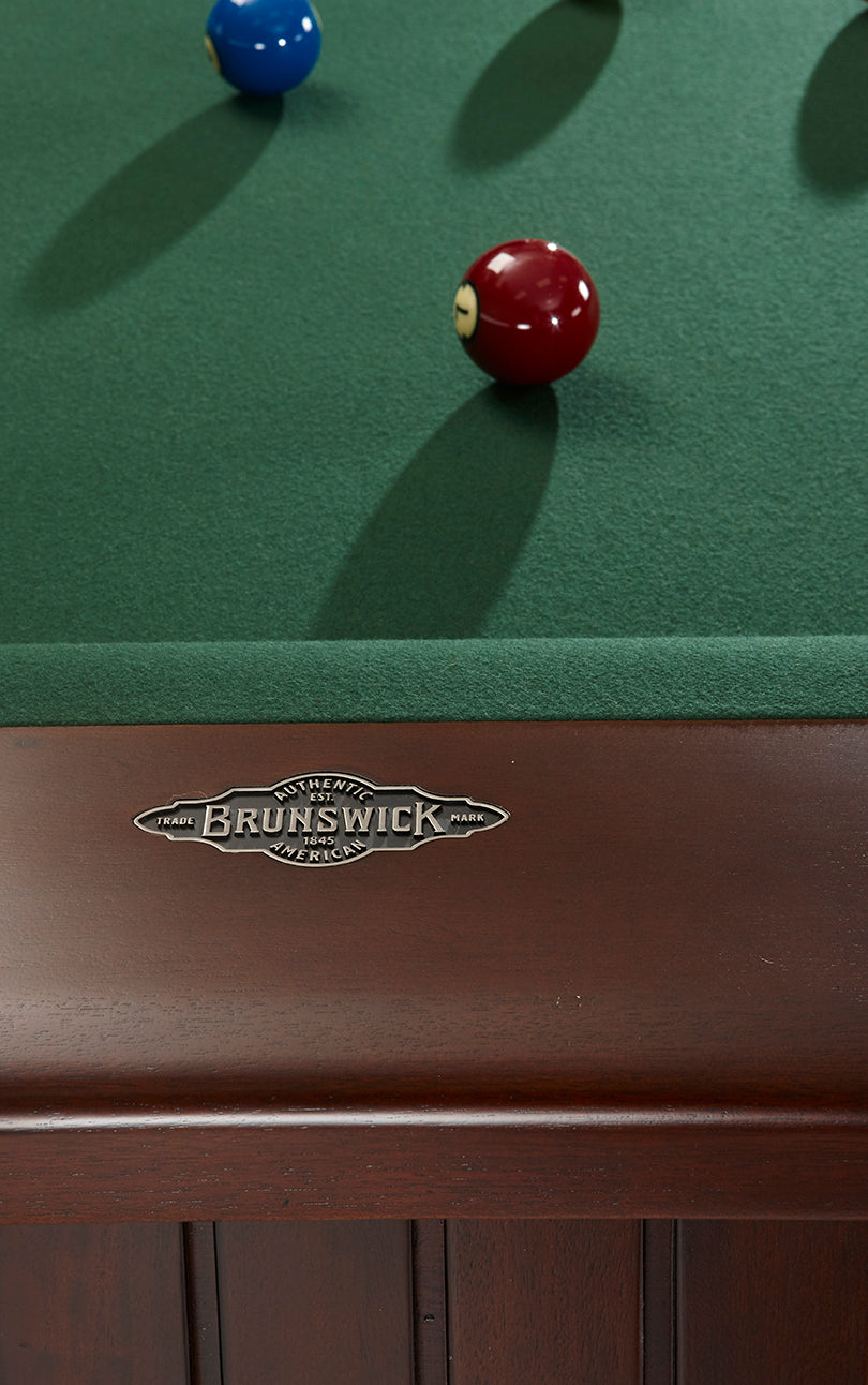 Brunswick Billiards Henderson 8' slate pool table in espresso with blue and red balls.