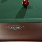 Brunswick Billiards Henderson 8' slate pool table in espresso with blue and red balls.