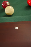 Billiard balls on a Brunswick Billiards The Henderson 8' Slate Pool Table in Espresso.