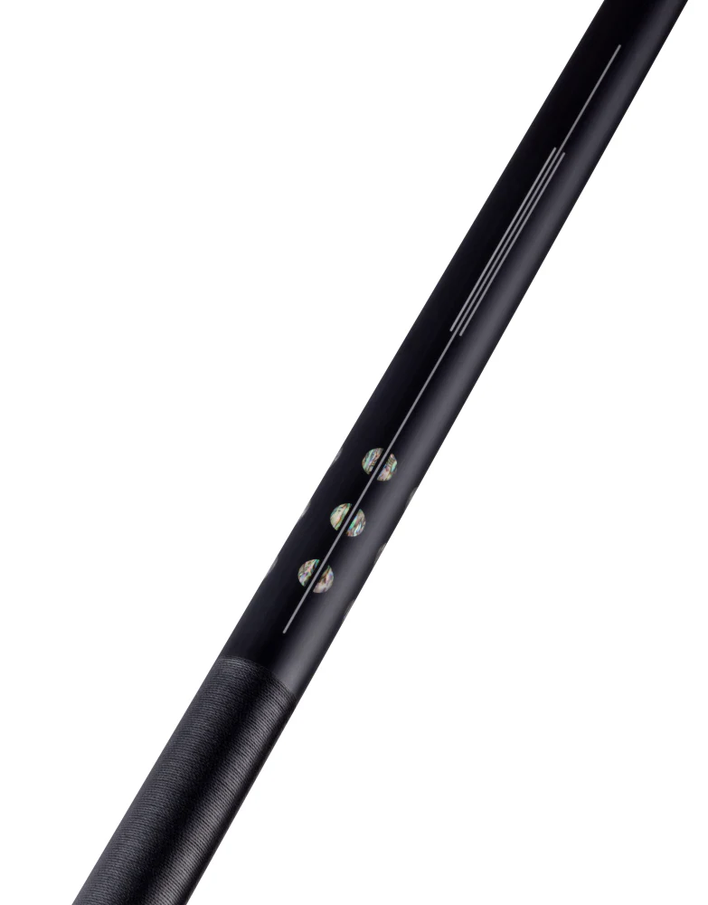 Close-up of a black cylindrical object with a white background
