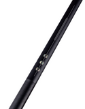 Close-up of a black cylindrical object with a white background