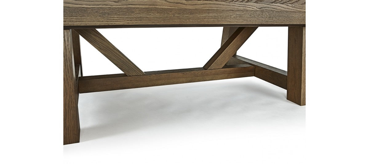 Close-up of the wooden base and legs of the Brunswick Billiards Botanic 8' Pool Table.