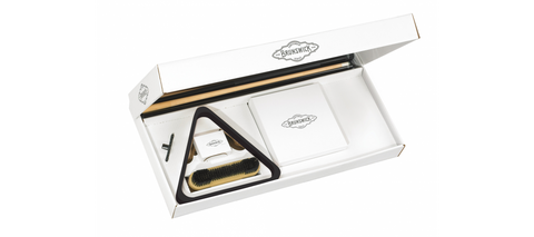 Open white gift box with brush, tray, and Brunswick Billiards Play Package inside.