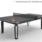 A black KettleBURN fitness table with a net, shown on a light gray background with a small text note at the top stating '* Conversion tops only - Pool table is not included'.