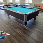 A Valley Panther Dakar Ebony Pool Table in a game room with ping pong and seating behind.