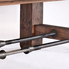Close-up of metal rods joining the wooden legs of the Brunswick Billiards Canton 7' Pool Table.