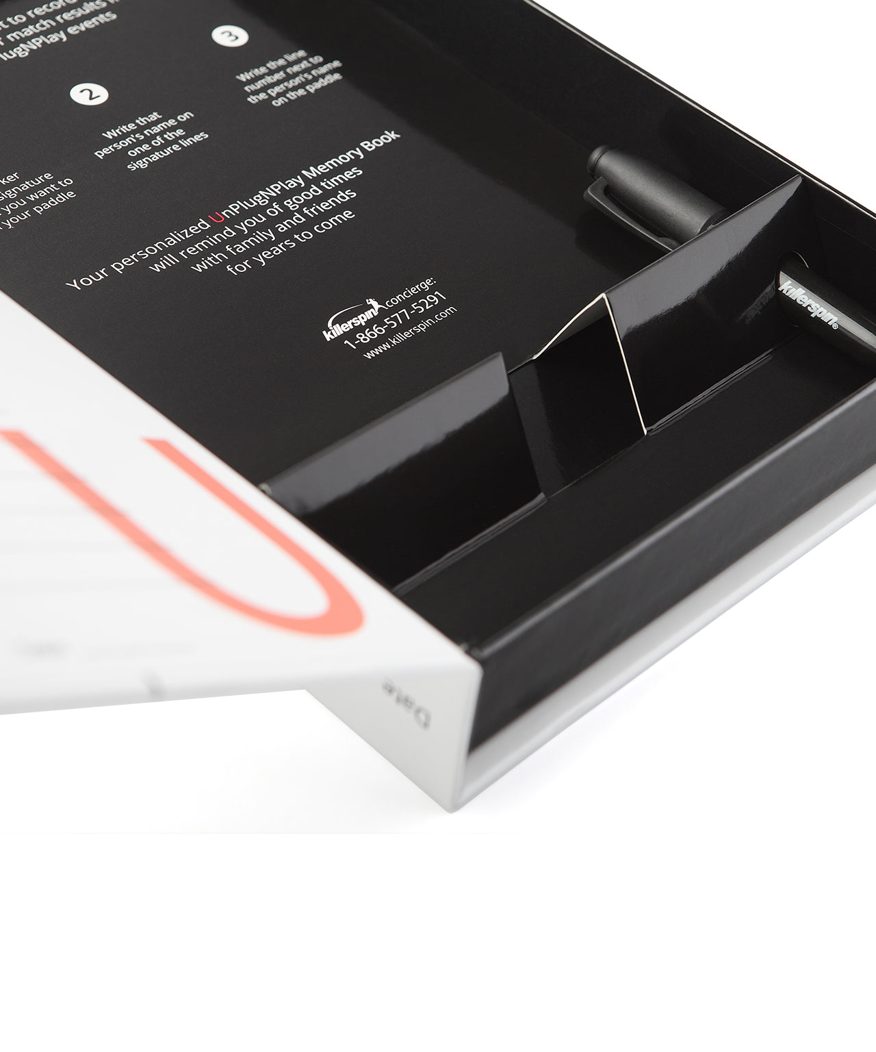 Memory book packaging with a pen and leaflet on a white background