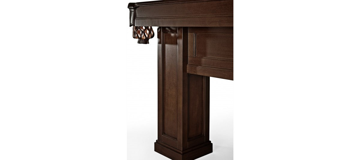 Close-up of Brunswick Billiards OAKLAND II 8' Pool Table leg with carved detail and leather pocket.