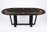 An oval poker table with a black felt playing surface, dark wood edges, and black metal legs, photographed on a clean white studio background.