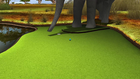 A mini-golf course with an elephant statue and an Incredible Technologies Arcade Collection Kit.