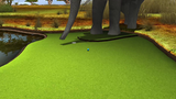 A mini-golf course with an elephant statue and an Incredible Technologies Arcade Collection Kit.