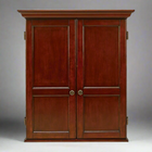 Wooden dartboard with two doors on a gray background