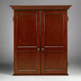 Wooden dartboard with two doors on a gray background
