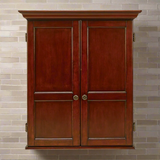 Wooden dartboard cabinet with two doors on a tiled wall