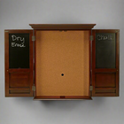 Wooden cabinet with two blackboards on a gray background