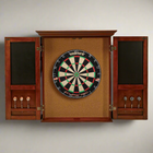Wooden dartboard cabinet with a dartboard inside, on a plain background