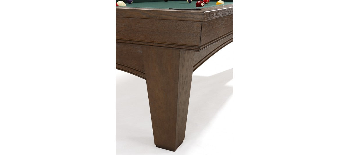Close-up of a Brunswick Billiards Winfield 8' Pool Table leg with felt top in a modern game room.
