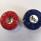 Playcraft Deluxe/Premium weights—one red, one blue—both round, textured with stick figure icons.