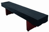 A Playcraft Home Series Deluxe Shuffleboard Kit with a black cover on the table.