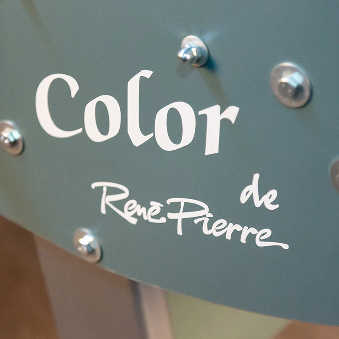 Close-up of Rene Pierre Color Menthe Indoor Foosball Table surface with visible bolts.