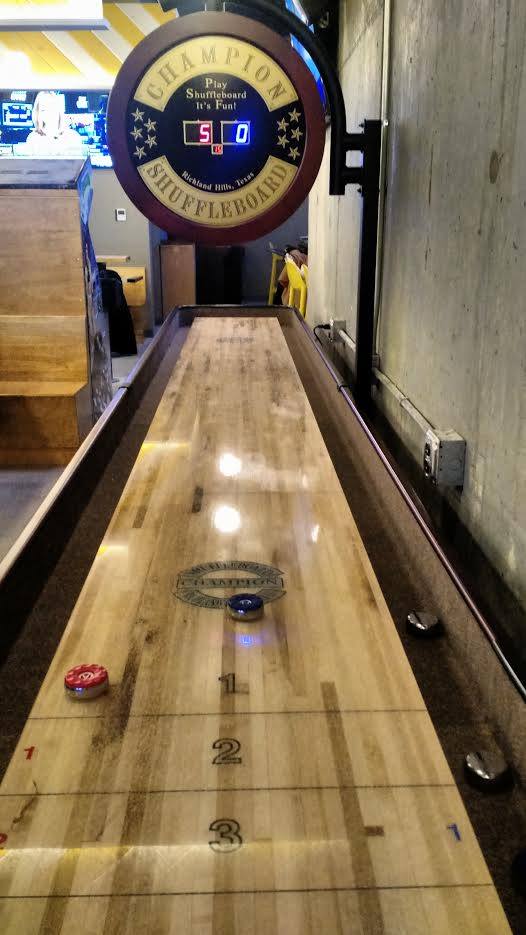 Champion 9' The Grand Champion Shuffleboard Table with pucks, scoreboard 5-0, Canadian Maple.